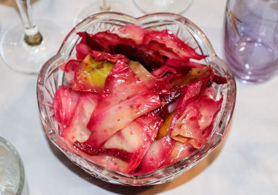 High angle view of strawberries in glass on table