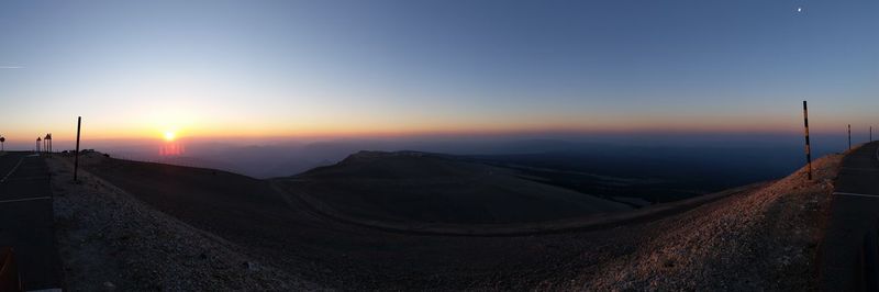 Scenic view of landscape at sunset