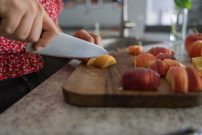 Close-up of cutting apple on the table