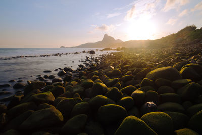 Scenic view of sea against sky during sunset
