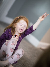 Portrait of a smiling girl at home