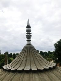 View of temple against cloudy sky