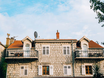 Low angle view of residential building against sky