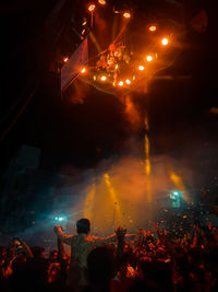 Crowd at music concert at night