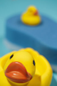 Close-up of yellow toys on table