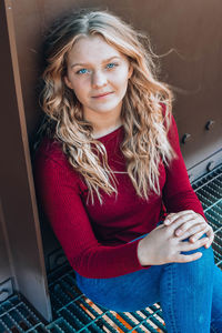 Portrait of beautiful young woman using mobile phone