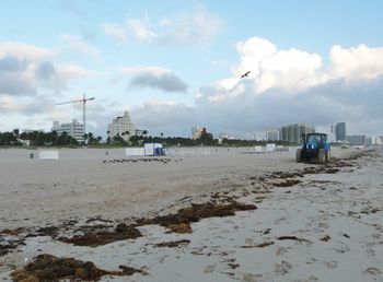 View of buildings against cloudy sky