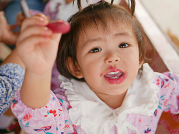 Portrait of cute girl at home