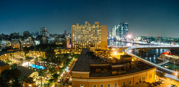 Aerial view of zamalek marriott hotel and surroundings at night.