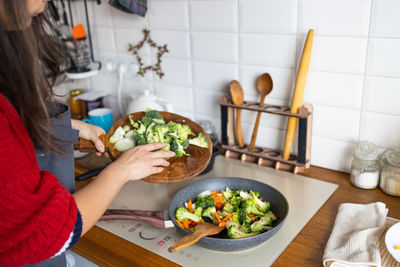 Midsection of woman having food