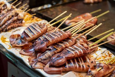 Close-up of seafood on barbecue grill