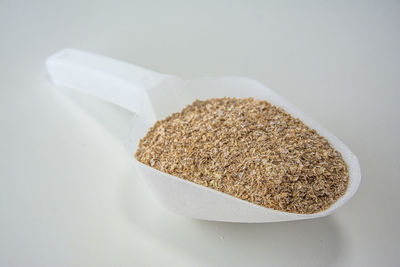 High angle view of bread on white table