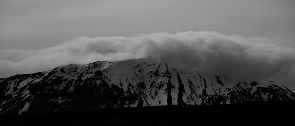 Panoramic view of volcanic mountain against sky