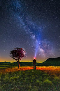View of man against milky way