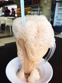 Close-up of ice cream on table