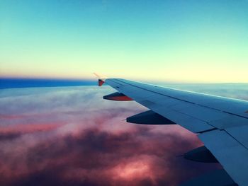 Cropped image of airplane wing