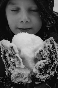 Close-up portrait of boy eating food