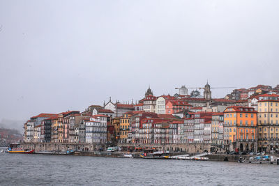 View of cityscape against clear sky