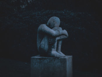 Close-up of angel statue in cemetery