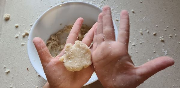 High angle view of person preparing food