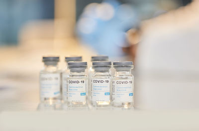 Close-up of covid-19 vaccine bottles