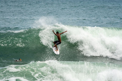 Man surfing in sea