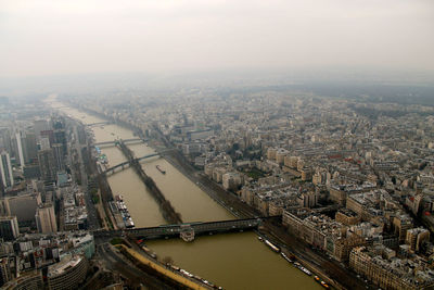 High angle shot of river along cityscape