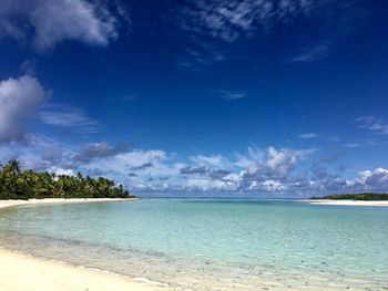 Scenic view of sea against blue sky