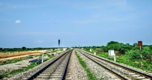 Railway tracks against clear sky