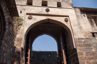 Low angle view of historic building against sky