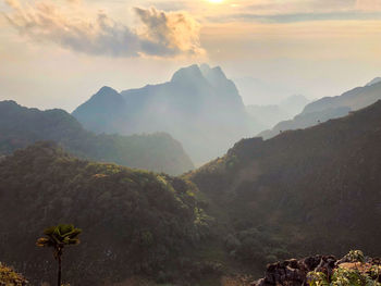 Scenic view of mountains against sky during sunset