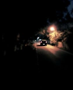 Cars on road at night