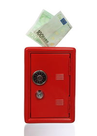 Close-up of red telephone booth against white background