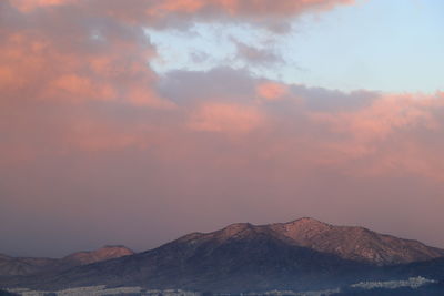 Scenic view of mountains against sky during sunset