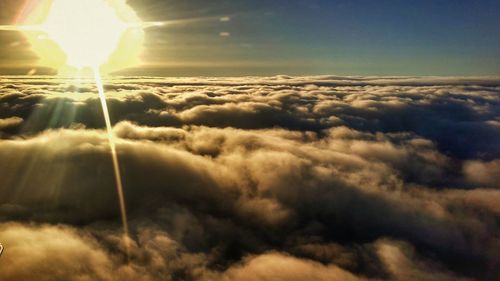 Sun shining through clouds