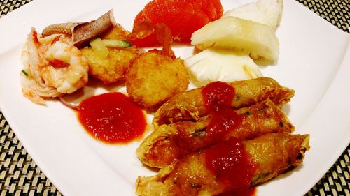 Close-up of served food in plate