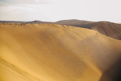 Scenic view of desert against sky