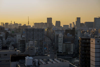 Cityscape against sky during sunset