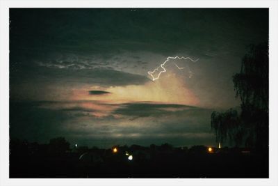 Scenic view of landscape against sky at night