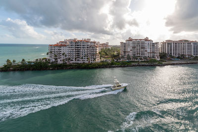 Boat motoring past fisher island miami