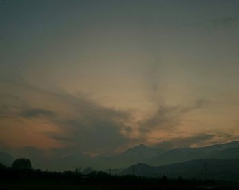 Scenic view of landscape against sky during sunset