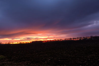 Scenic view of dramatic sky during sunset