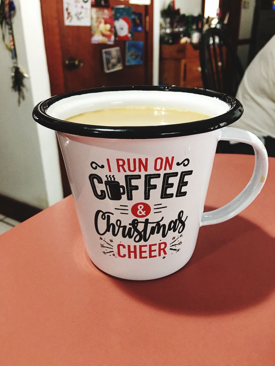 coffee - drink, coffee cup, drink, text, food and drink, western script, refreshment, table, cup, indoors, close-up, communication, cafe, saucer, no people, focus on foreground, frothy drink, freshness, cappuccino, day, mocha, froth art