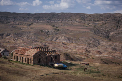 Panoramic view of landscape and houses against sky