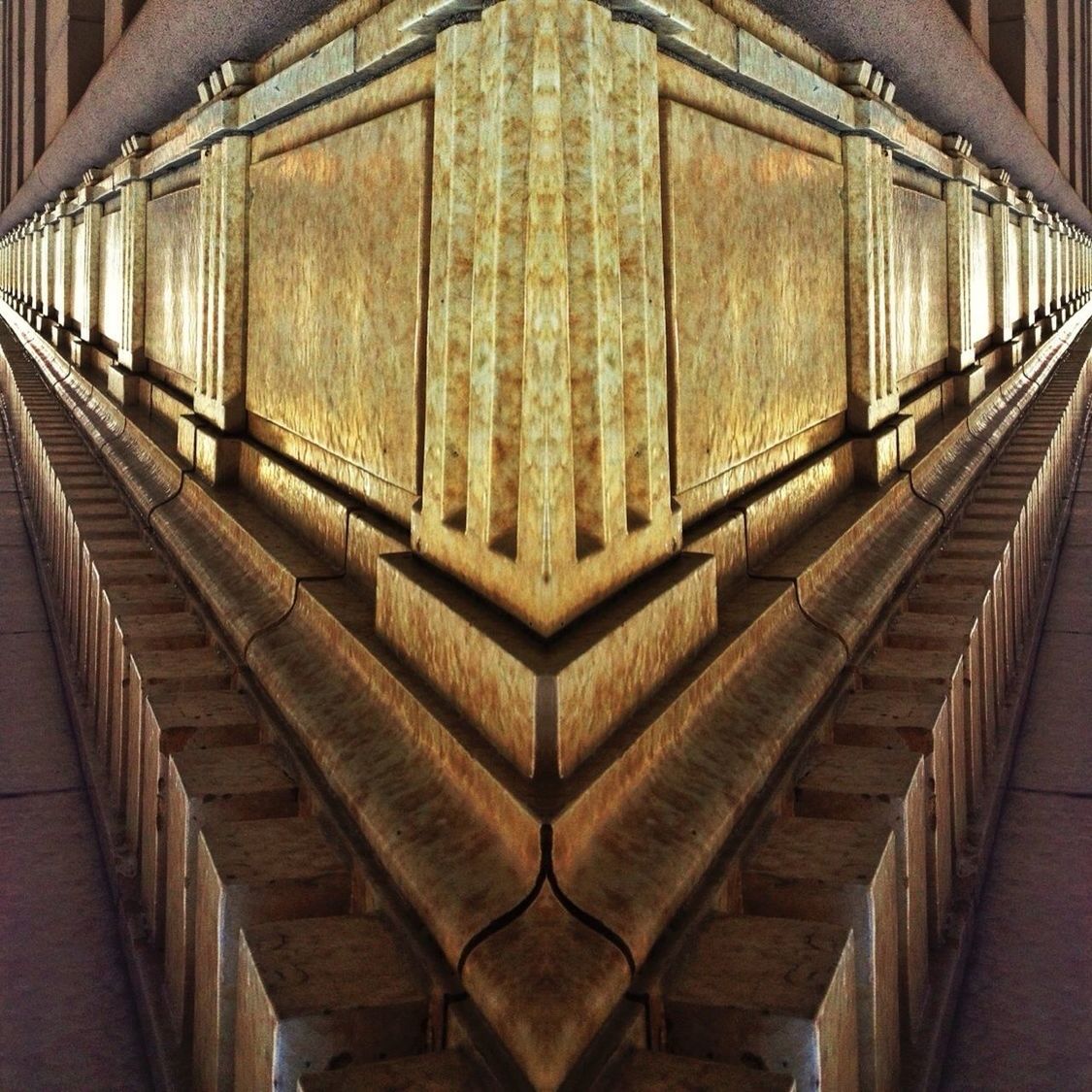 architecture, built structure, the way forward, diminishing perspective, steps, railing, railroad track, steps and staircases, vanishing point, indoors, in a row, staircase, rail transportation, building exterior, railroad station, wall - building feature, day, no people, architectural column, railroad station platform
