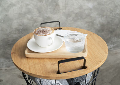 Close-up of coffee cup on table