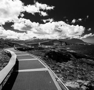 View of mountain range against cloudy sky