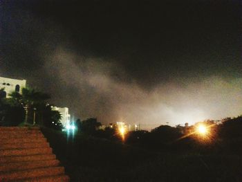 Scenic view of landscape against sky at night