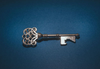Close-up of metal against blue background