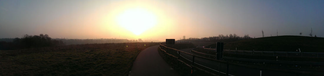 Road passing through field